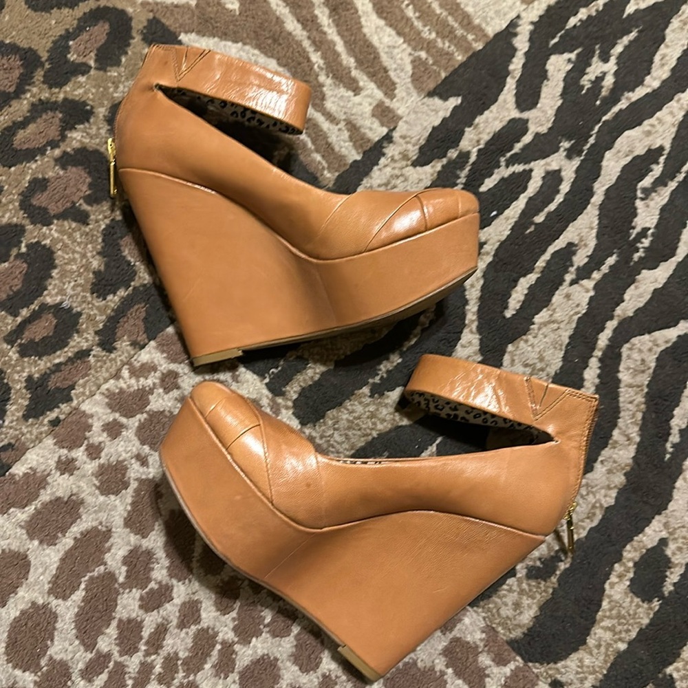 Jessica Simpson, size 6.5 caramel tan color, wedge heels with ankle straps.
